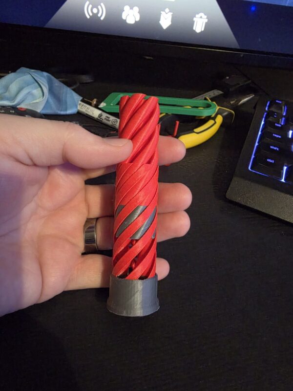 Shotgun Shell Inspired Twist Fidget photo 2 Shotgun shell inspired 3D printed twist fidget toy by Binary Atlas