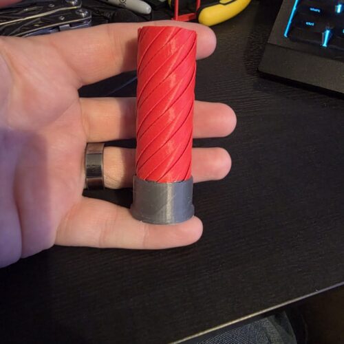 Shotgun shell inspired 3D printed twist fidget toy by Binary Atlas